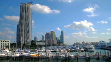 海滨城市高楼码头游艇视频素材