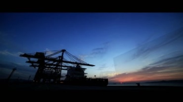 货轮海轮在大海中航行港口码头集装箱装卸视频素材