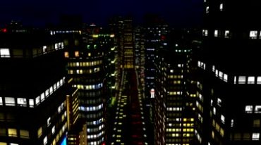 城市高楼大厦灯光夜景楼宇穿梭直升机视角视频素材