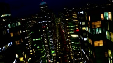 城市高楼大厦灯光夜景楼宇穿梭直升机视角视频素材