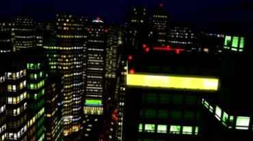 城市高楼灯光夜景飞越城市上空动态穿梭视频素材