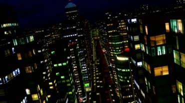 城市高楼灯光夜景飞越城市上空动态穿梭视频素材