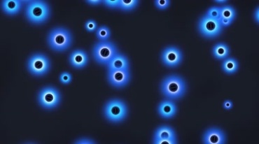 发蓝光的粒子光晕包围唯美光效视频素材