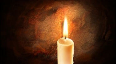 蜡烛火焰斑驳墙壁烛光摇曳视频素材