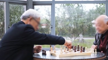 老人下棋对弈养老院晚年休闲生活视频素材