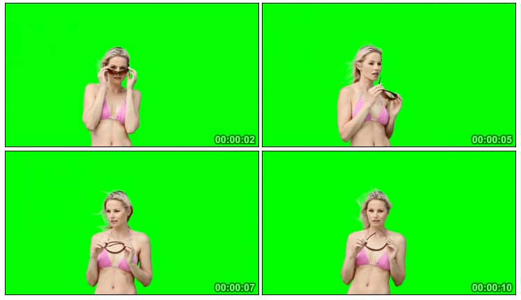 白人金发泳装美女展示墨镜绿屏抠像影视特效视频素材