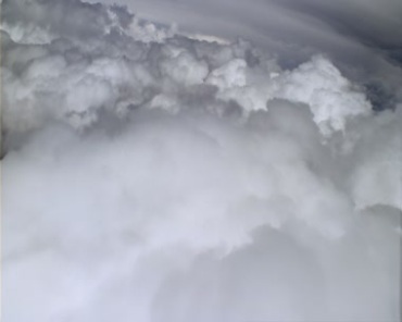 飞机飞越云层之上白色云团视频素材
