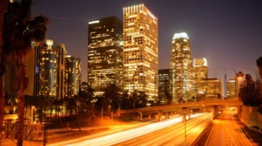 繁华都市高楼灯火通明马路车流城市夜景延时摄影视频素材
