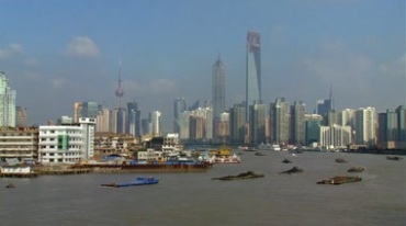 上海黄浦江货船航行高楼建筑群远景实拍视频素材