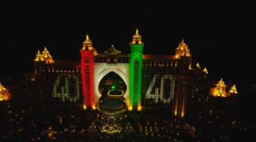 迪拜棕榈岛亚特兰蒂斯酒店夜景灯光航拍视频素材