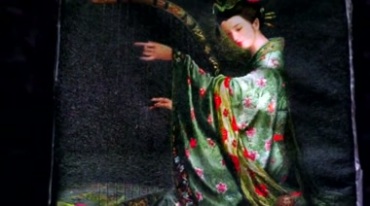 江南刺绣苏绣古典旗袍女人弹琴夜景实拍视频素材