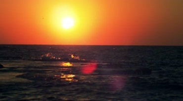 海上日落夕阳西下晚霞海面浪花美景视频素材