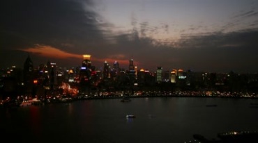 城市高楼江边灯光夜景延时摄影视频素材
