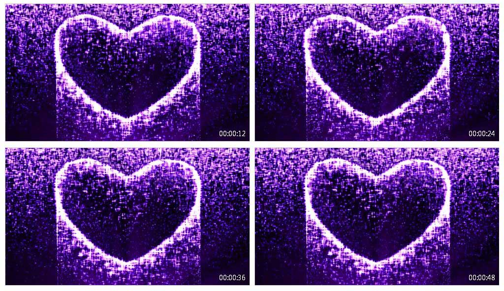 紫色心形流光粒子火星掉落特效视频素材