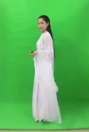 帅气白衣美女手拿折扇绿布抠像后期特效视频素材