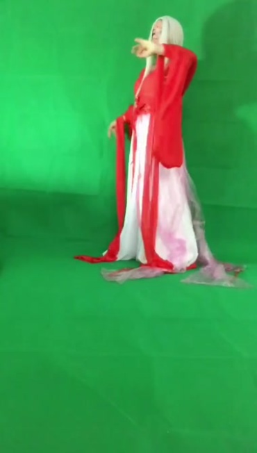 红衣白发魔女跳舞绿布抠像后期特效视频素材