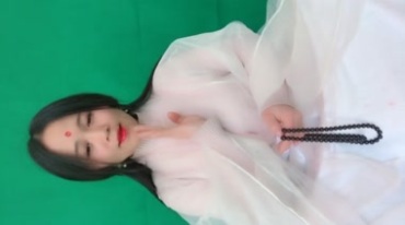 白衣少女唱歌经文绿布抠像后期特效视频素材