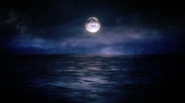 月黑风高夜空海上明月背景视频素材